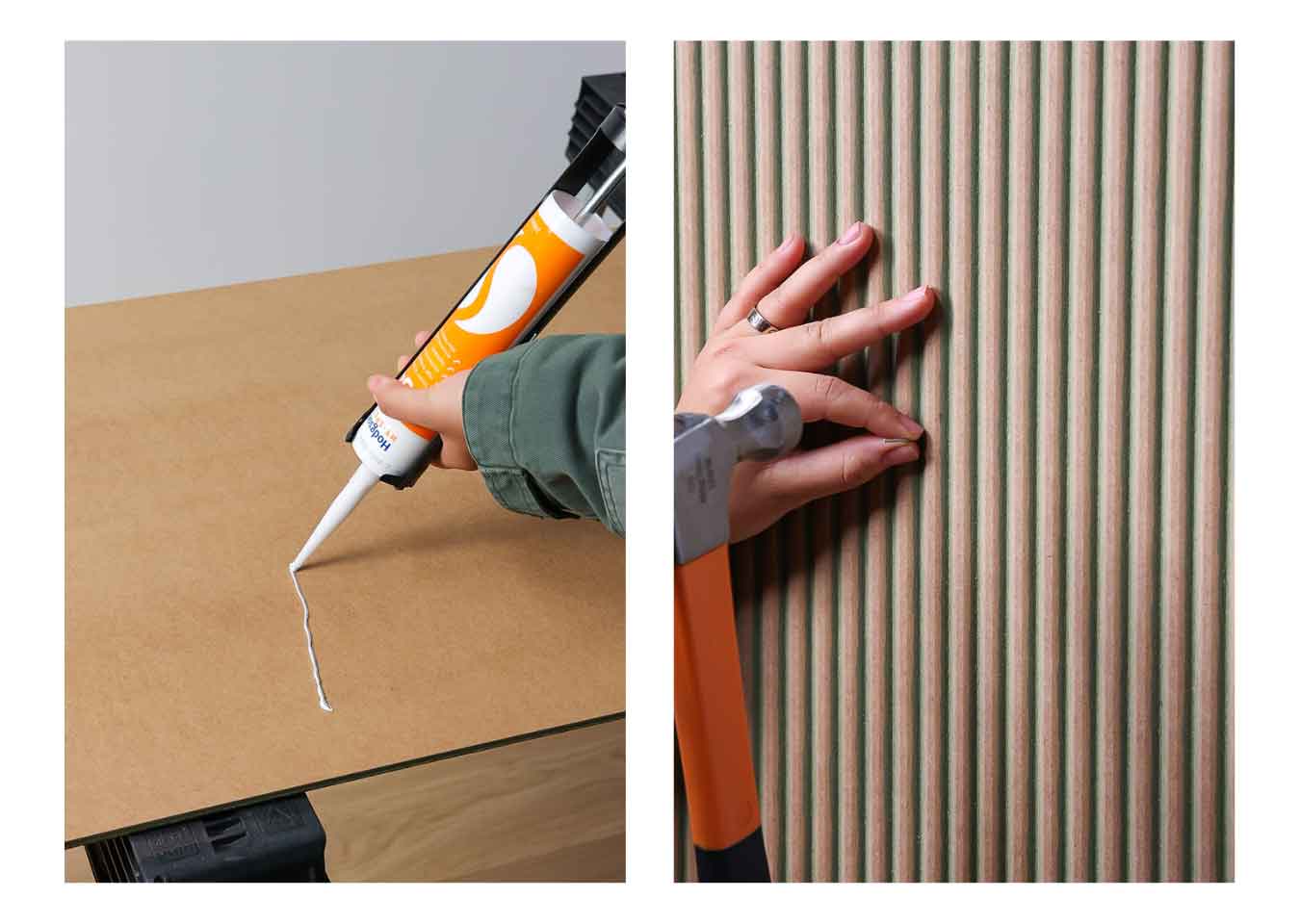 A person wearing a green jacket applying adhesive to the back of a panel and pinning the panel on a wall with a hammer.